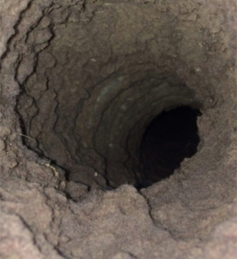 Dryer vent packed solid with lint before cleaning, OKC metro
