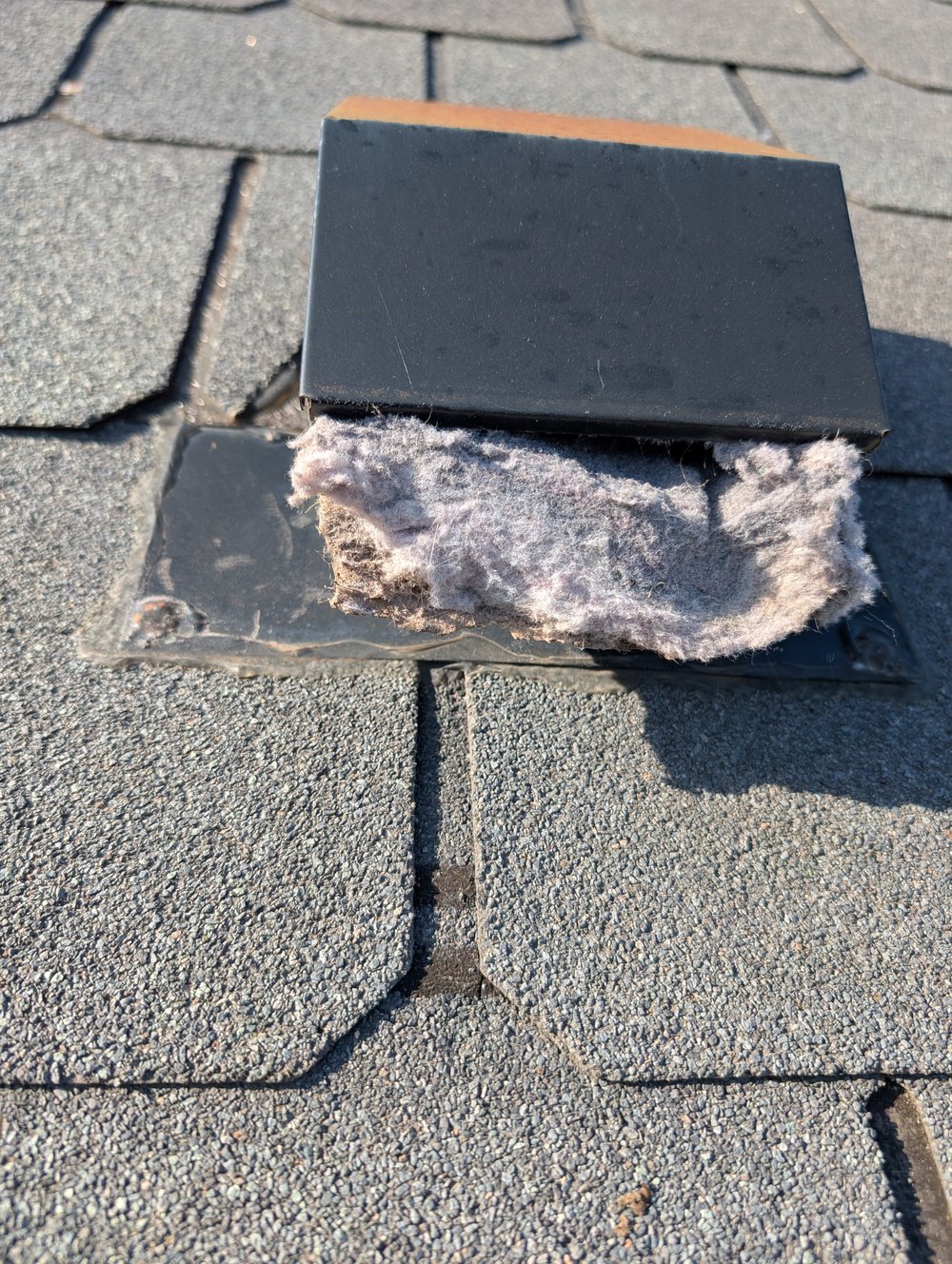 Roof dryer vent completely clogged with lint blocking airflow